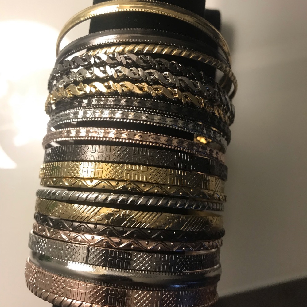 Gold and silver bangle bracelet set.